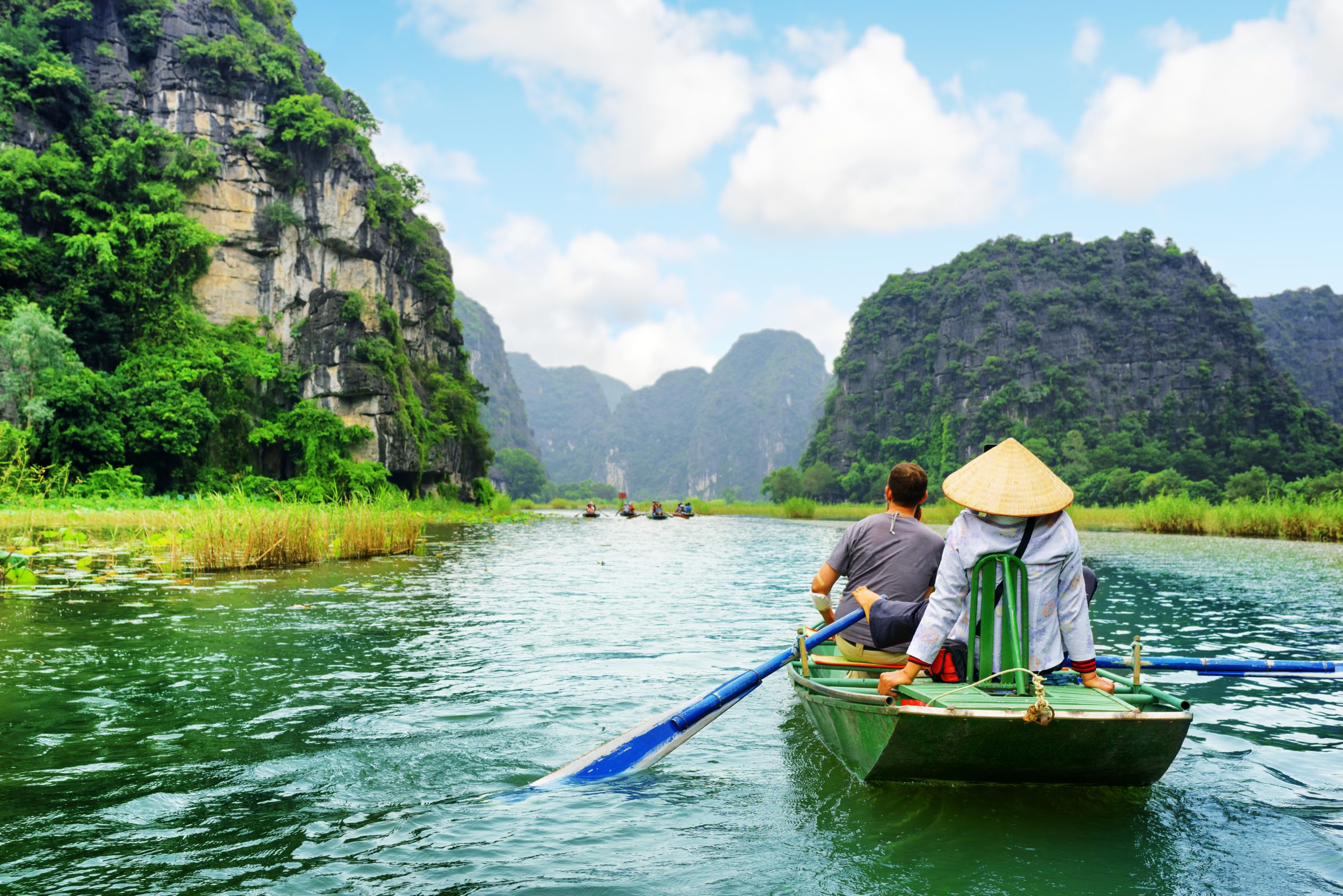 Tourists,Traveling,In,Boat,Along,The,Ngo,Dong,River,At
