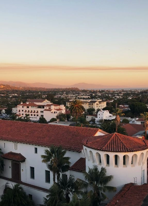https://vabeau.crea8ivedev.com/wp-content/uploads/2026/05/Santa-Barbara-red-roofs-of-the-Santa-Barbara-county-courthouse-are-a-symbol-of-the-coastal-Southern-California-community.webp