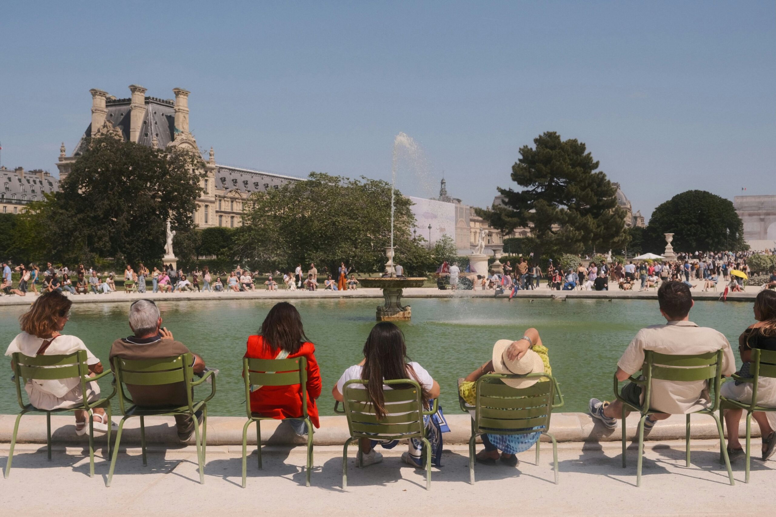 Green chairs by the pond, Paris